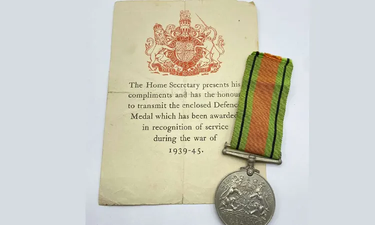 Personal items like letters from home, rations, journals, and medals